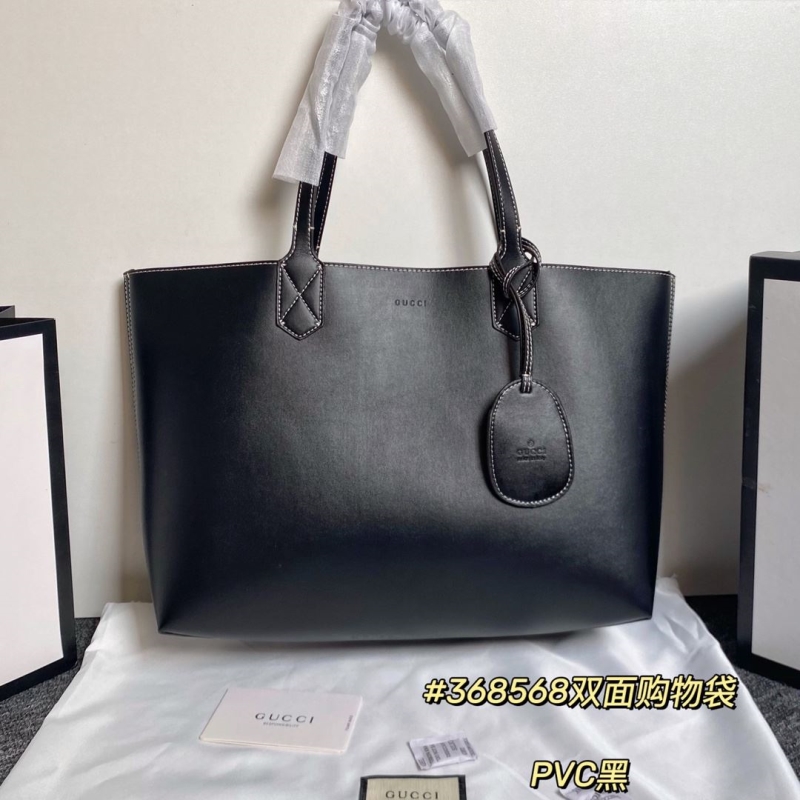 G*u*i shopping bags